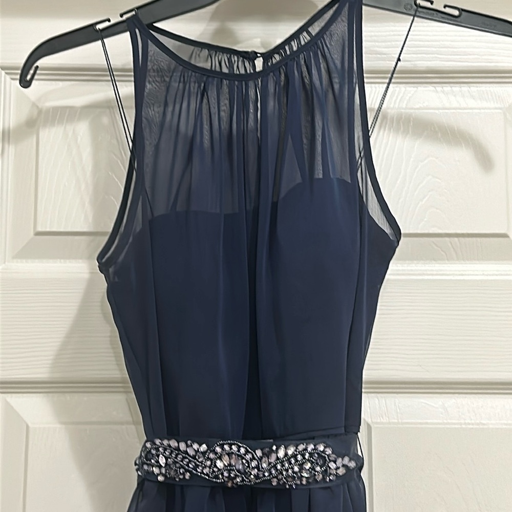 Adrianna Papell navy blue dress with pockets.